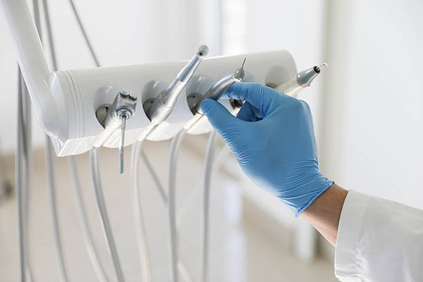 Professional Tooth Extraction technician working in Fair Oaks, VA